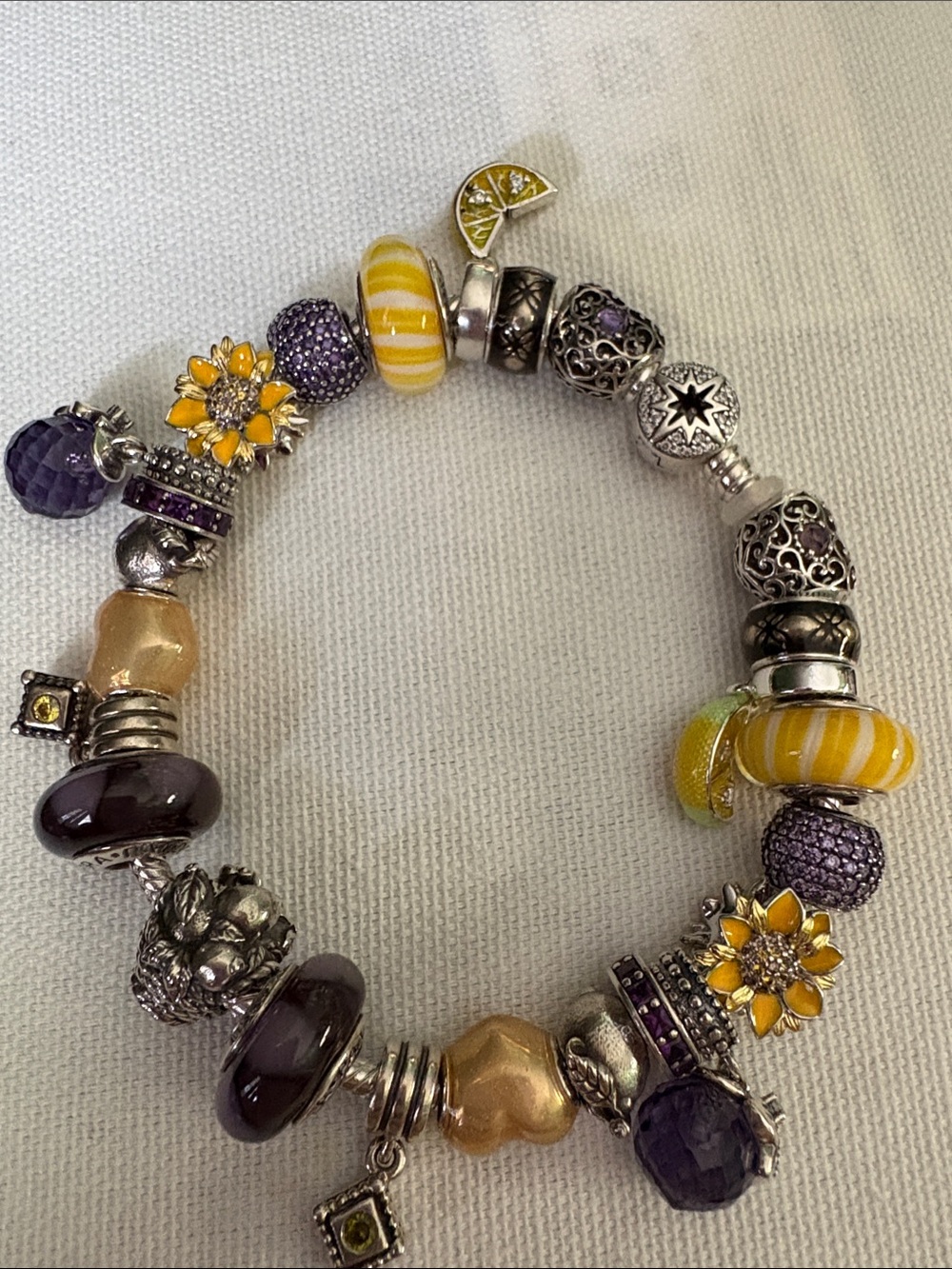 Pandora bracelet lemon/yellow/purple charms